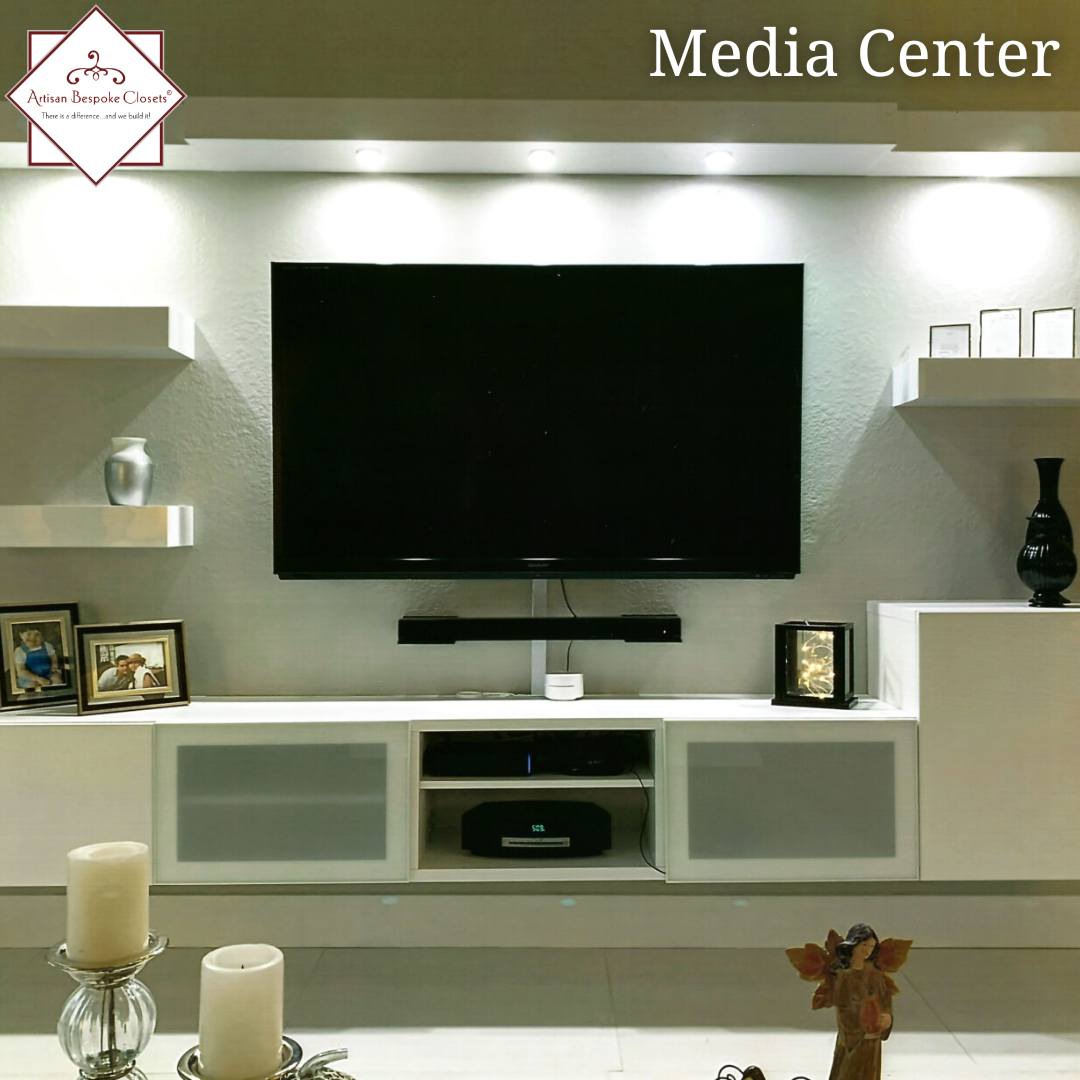 A home with a closet entertainment center in living area.